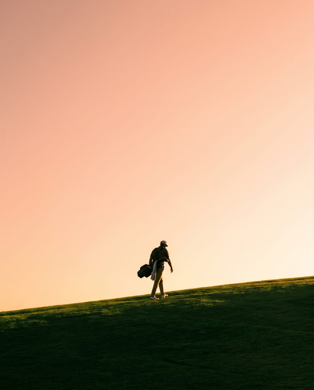 Golden-hour fairway at a golf academy